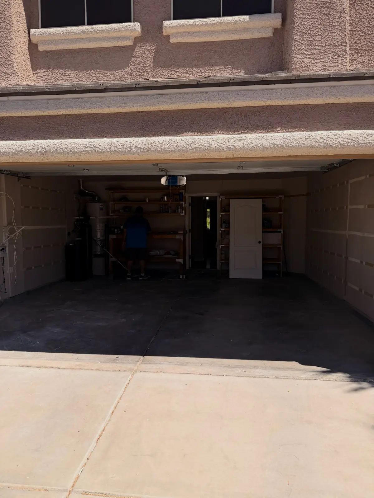 The same Chandler garage floor clear; shelving, water heater and workbench remain
