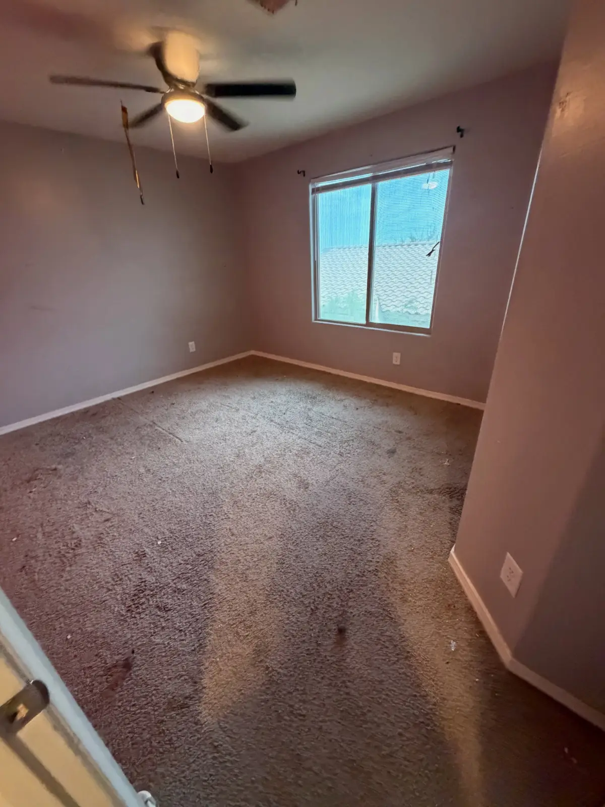 The same Chandler bedroom empty to the carpet