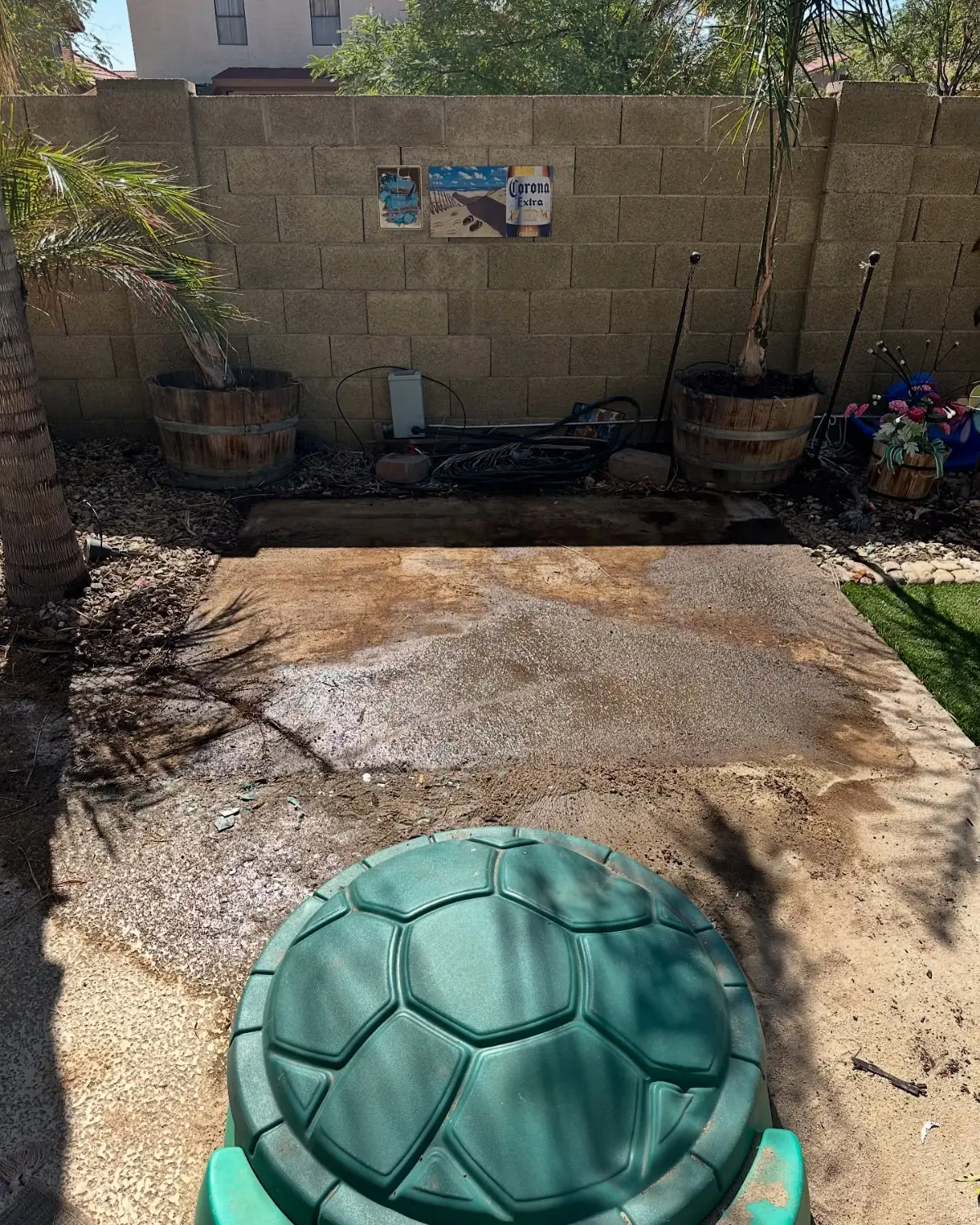 The same Chandler backyard with the hot tub gone and the pad bare