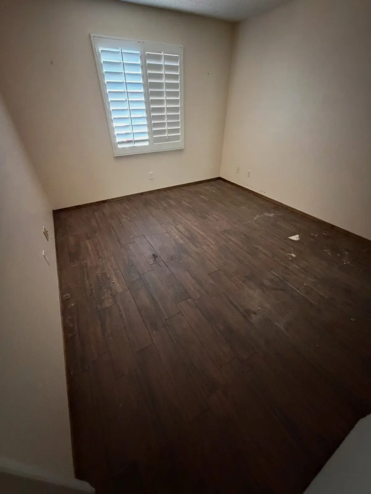 The same Gilbert bedroom empty with the plantation shutters open