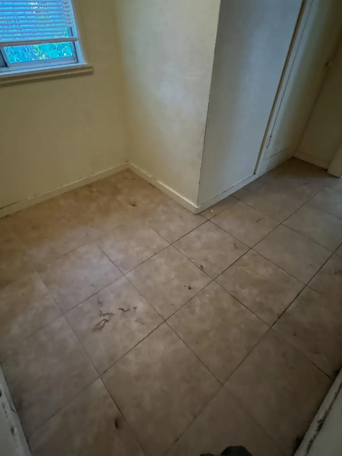 The same Gilbert bedroom empty to the tan tile floor
