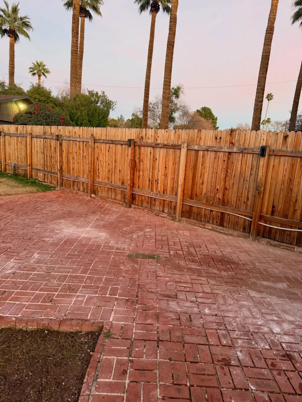 The same Mesa brick patio with the debris pile gone