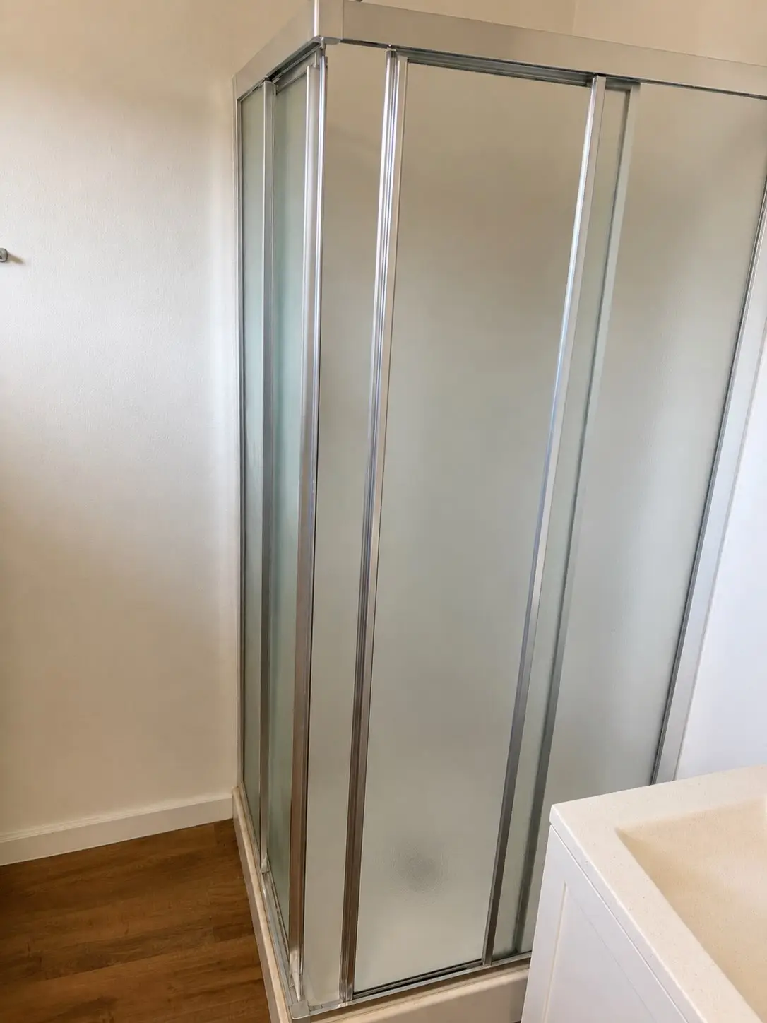 The same Mesa shower stall emptied and the floor beside it clear