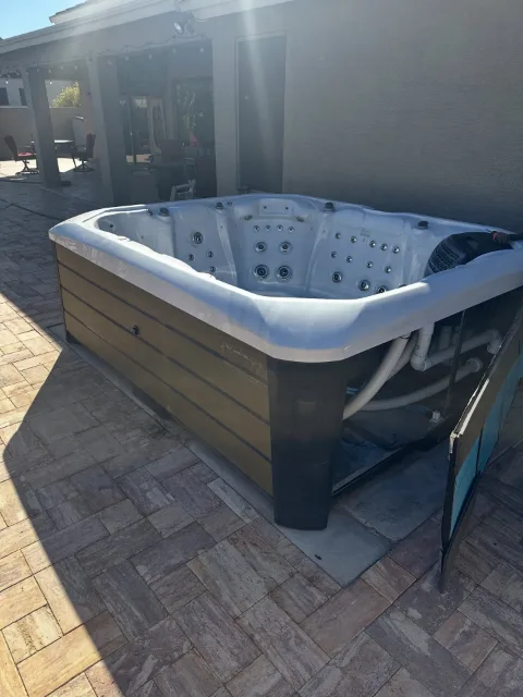 Hot tub on a Mesa patio before Haulo removed it