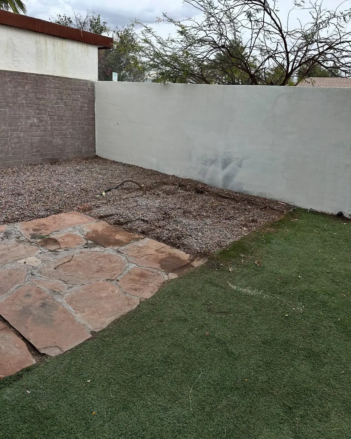 The same Phoenix backyard corner with the hot tub gone