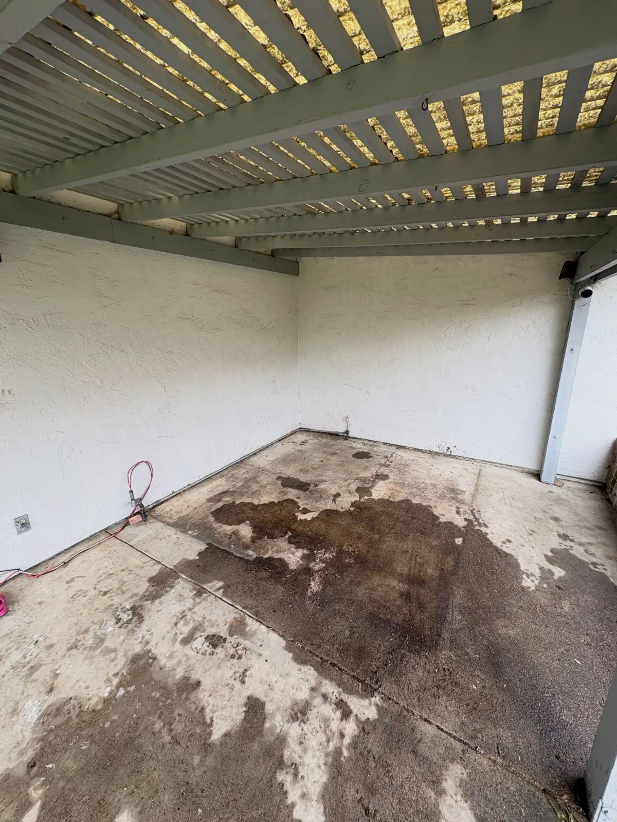 The same Tempe pergola with the hot tub gone and the pad empty