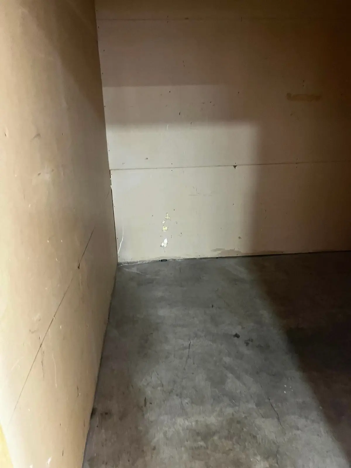 The same Tempe storage unit empty to the bare concrete